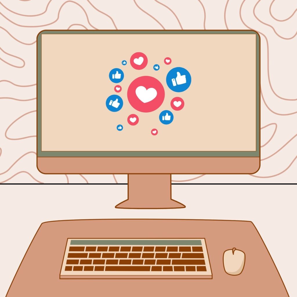 A graphic computer, keyboard and some likes/reactions from social media on the screen